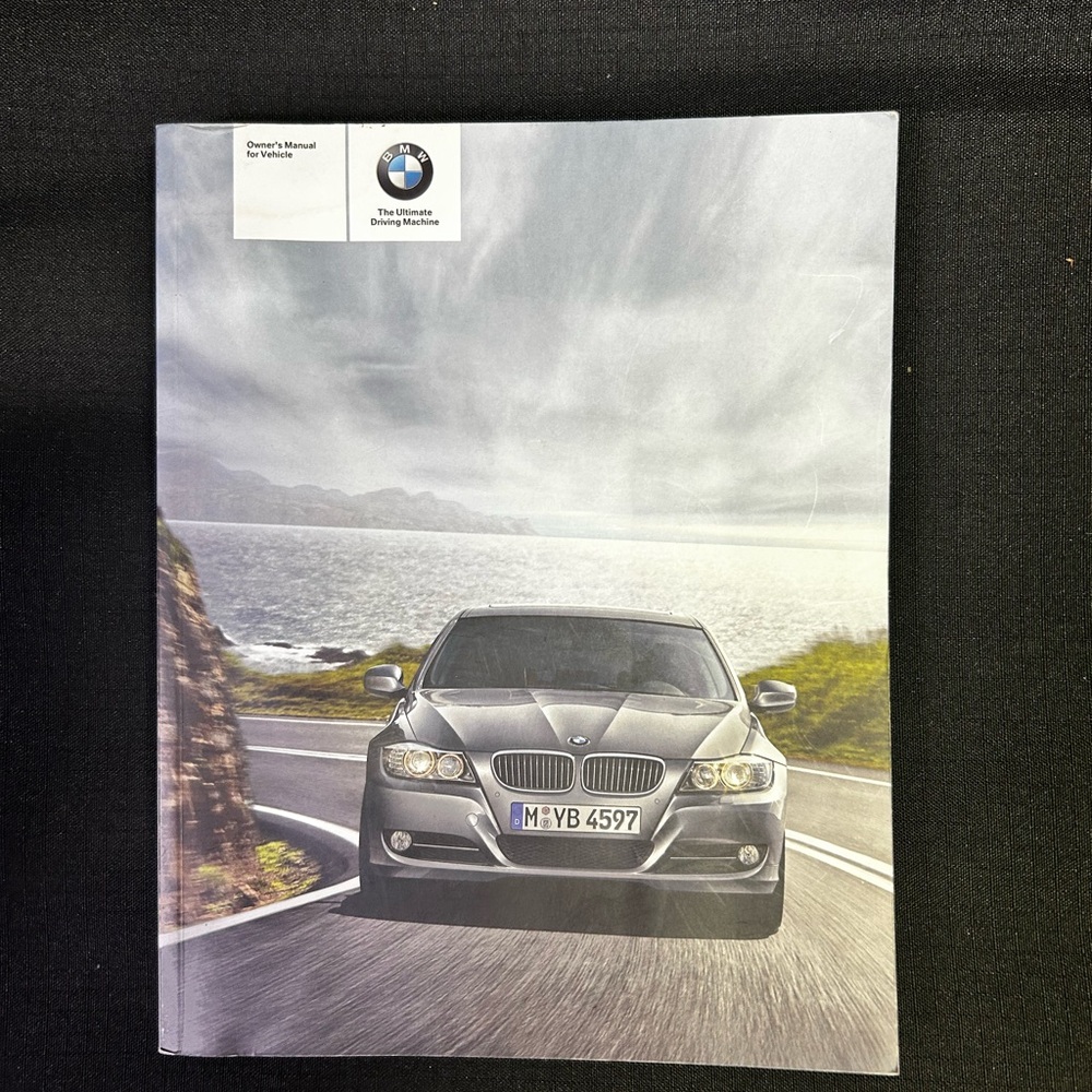 BMW Owner's Manual with Blue Text